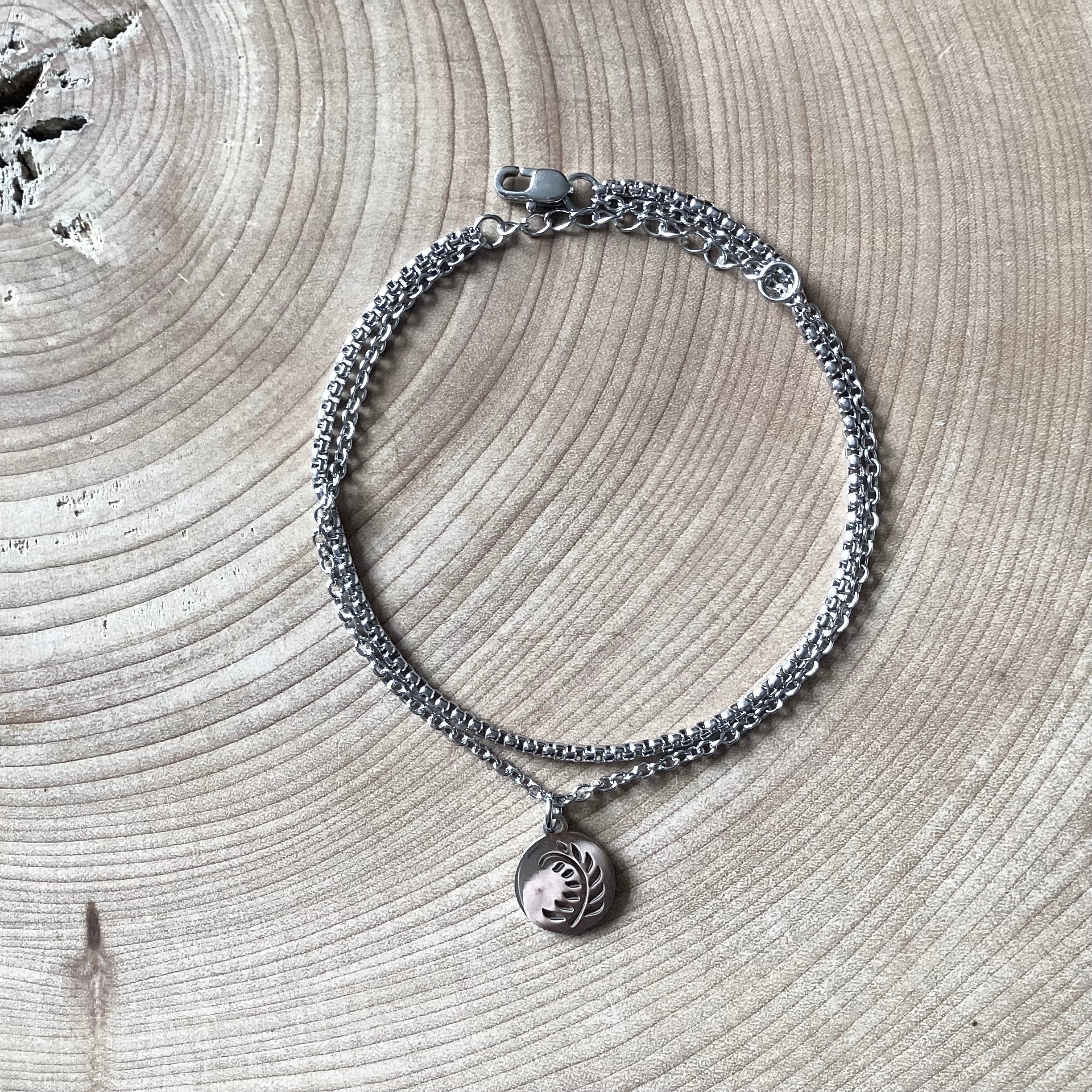 Multi-row bracelet in silver and black stainless steel