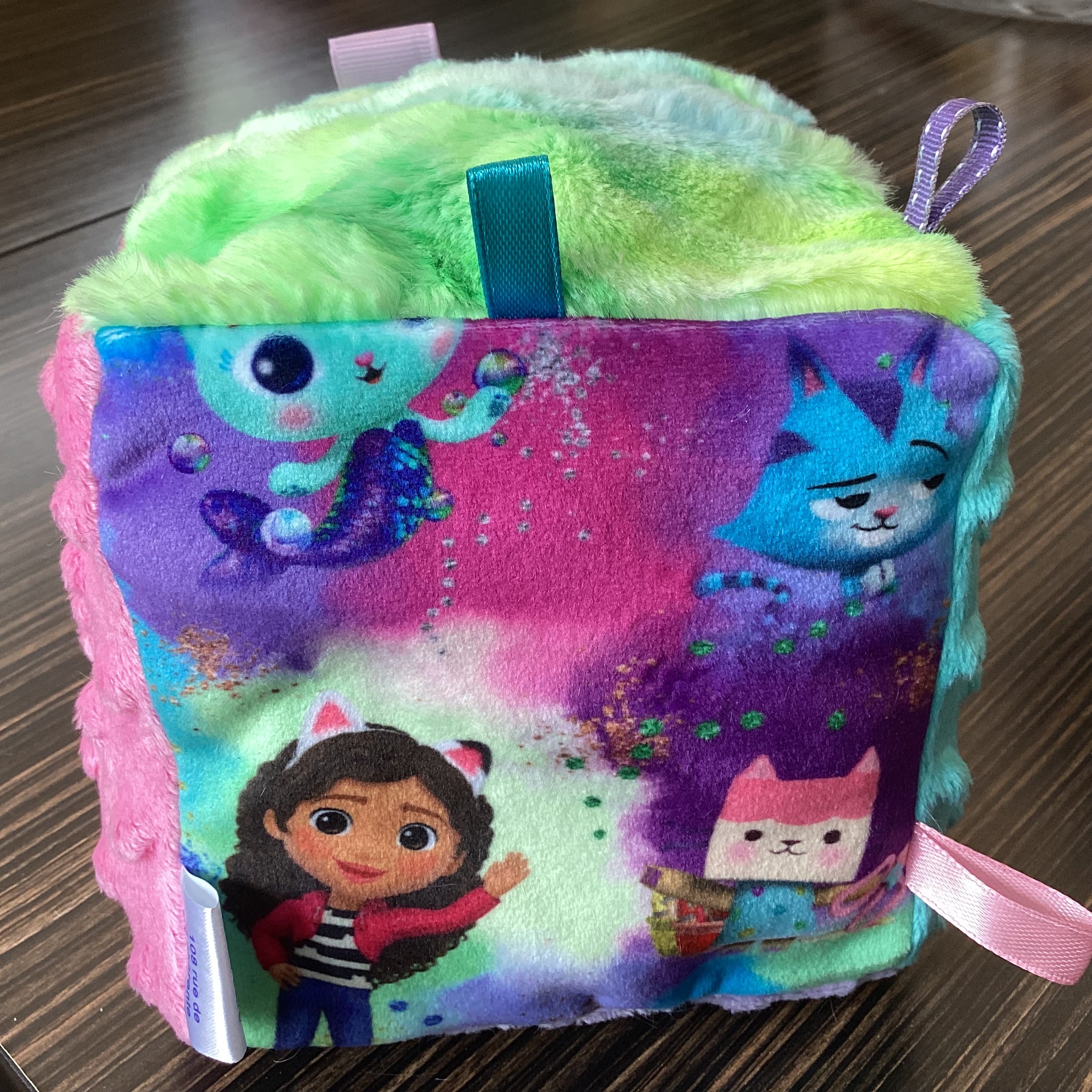 Little girl and her cats activity cube