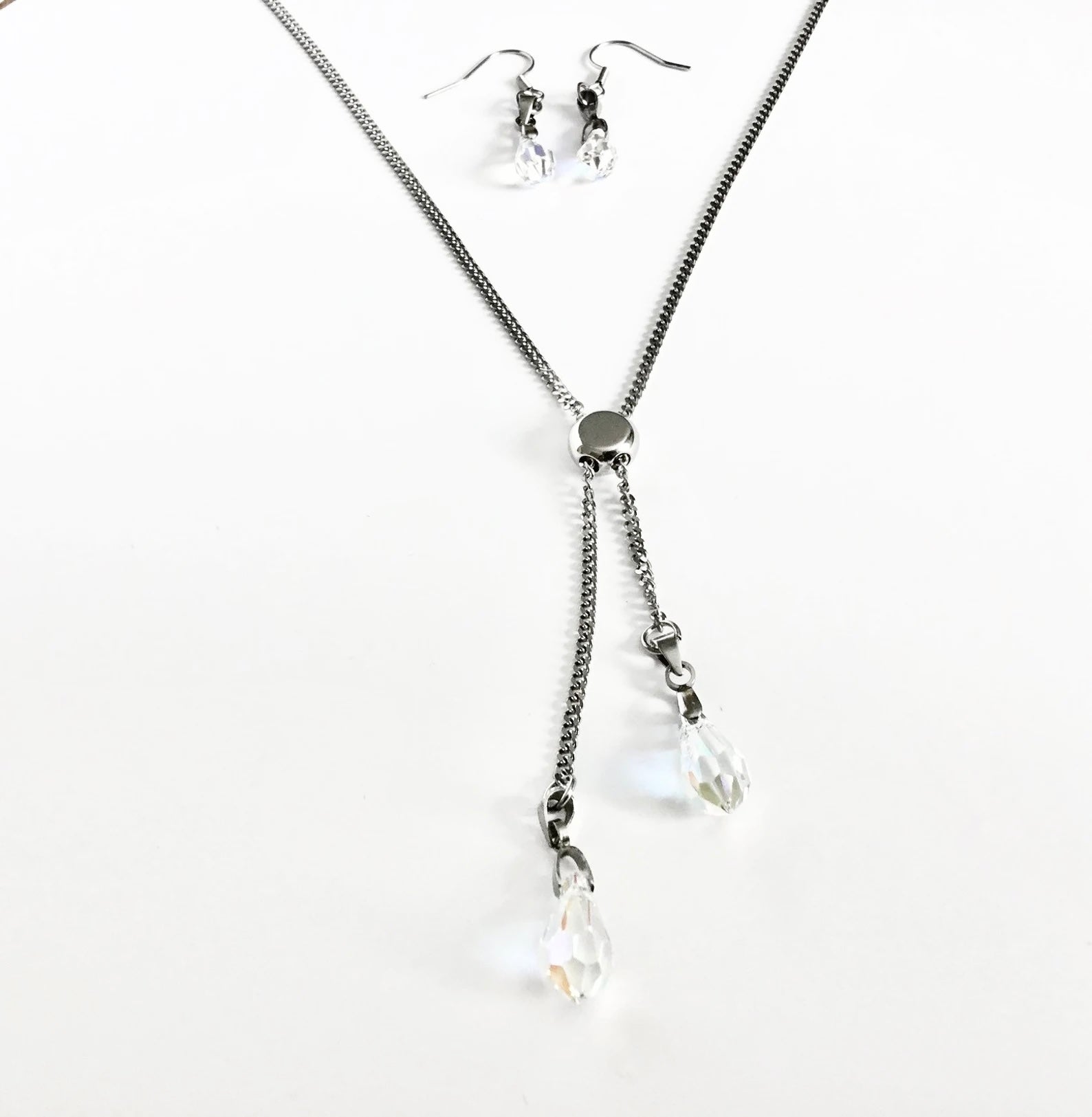 Stainless steel and clear Swarovski necklace and earrings