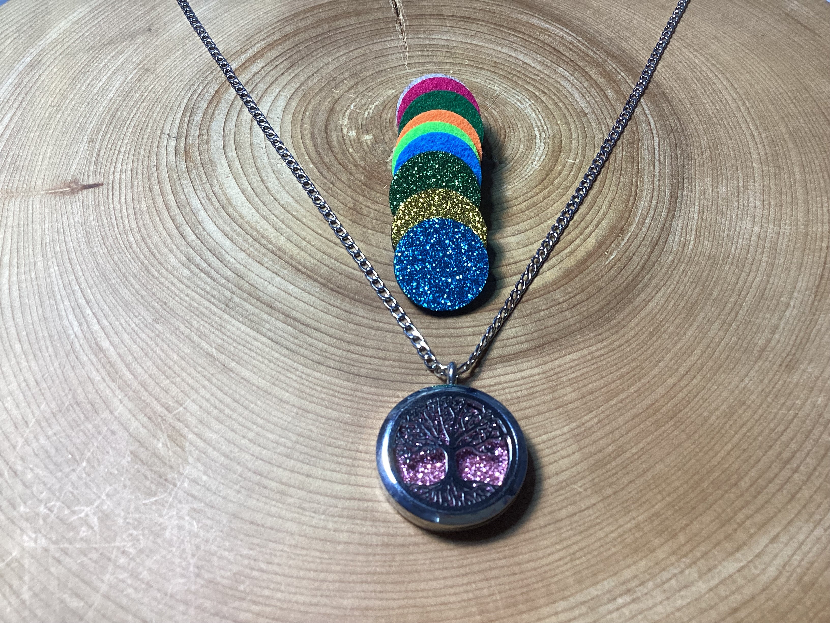 Tree of life stainless steel diffuser necklace.