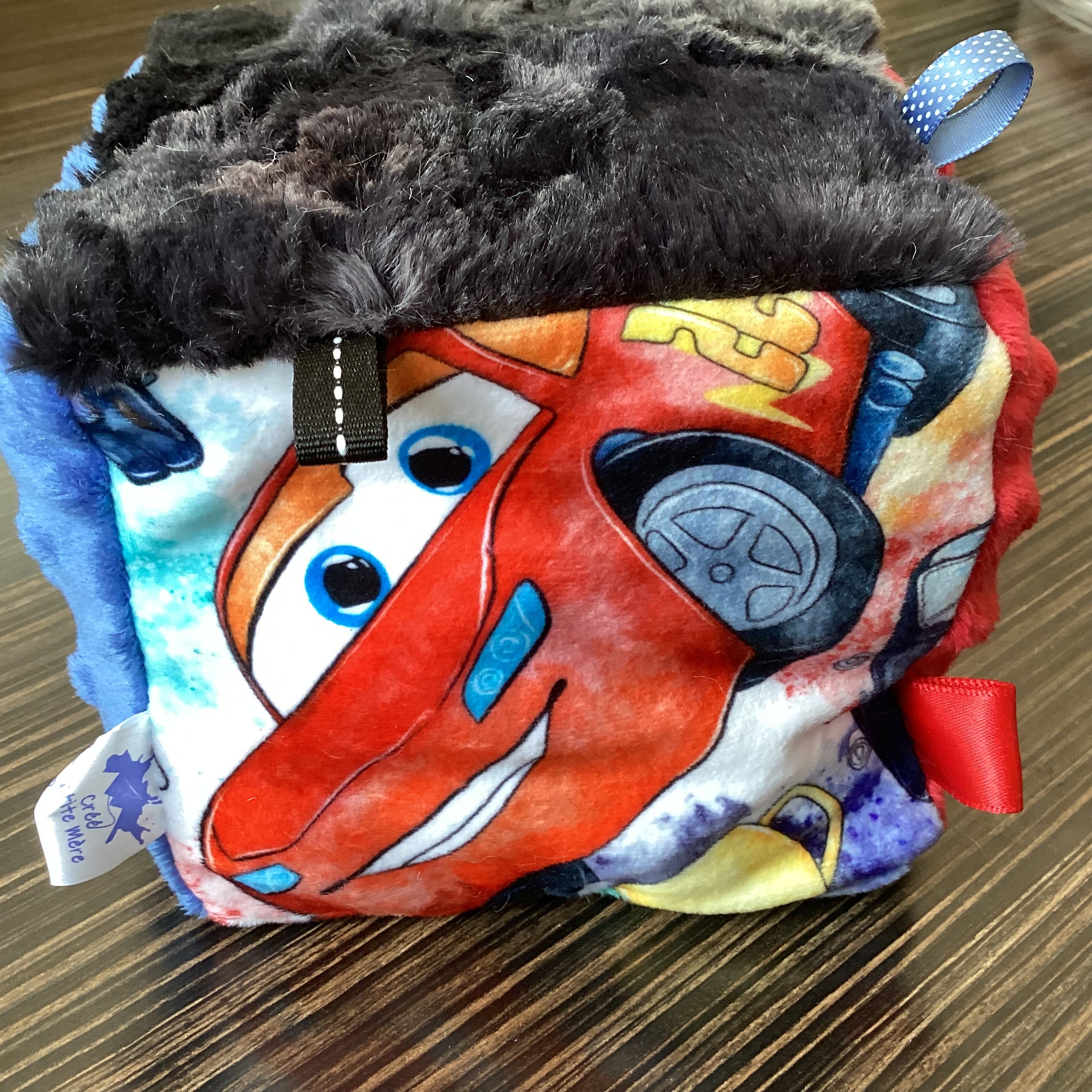 Red auto racing awakening cube with eyes