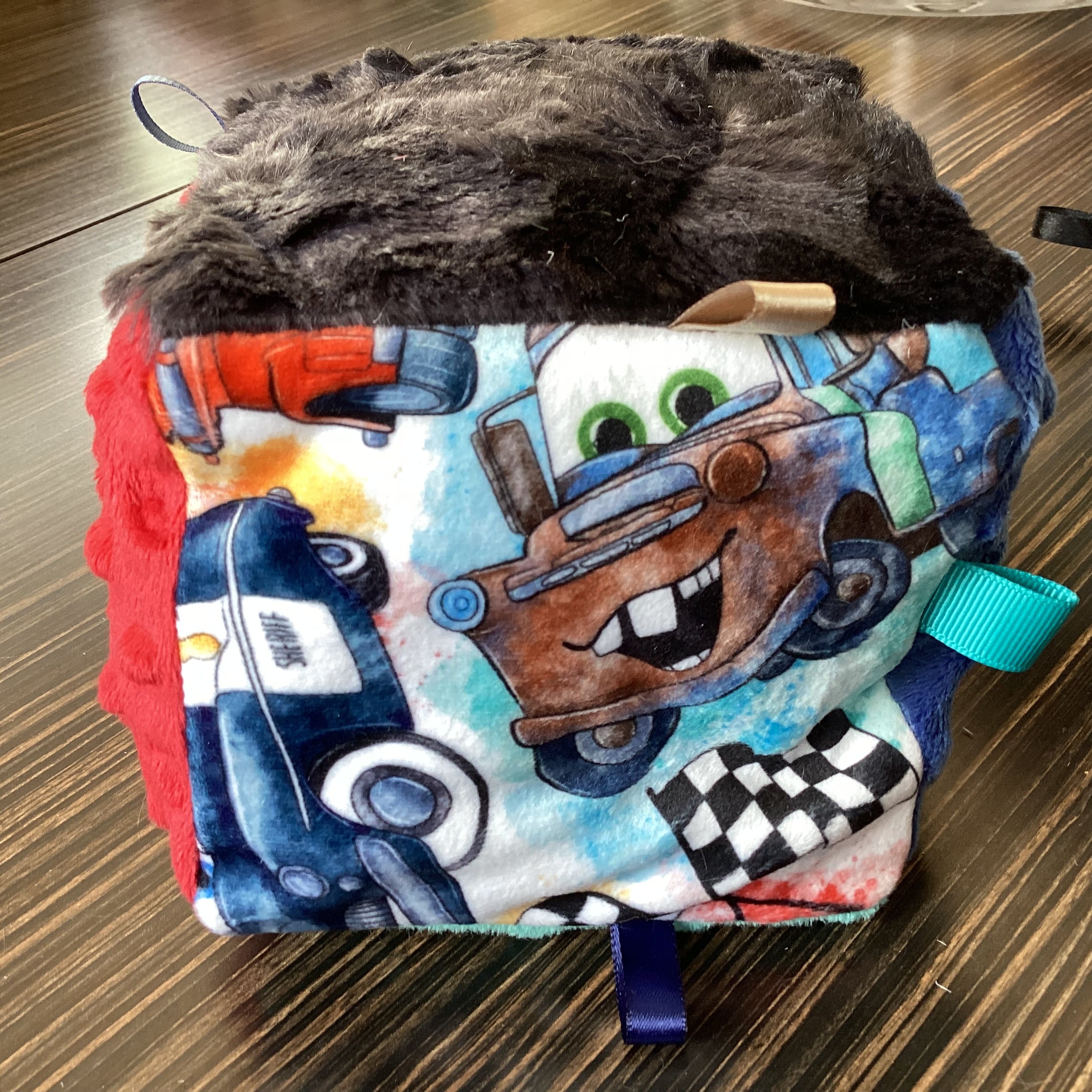Red auto racing awakening cube with eyes
