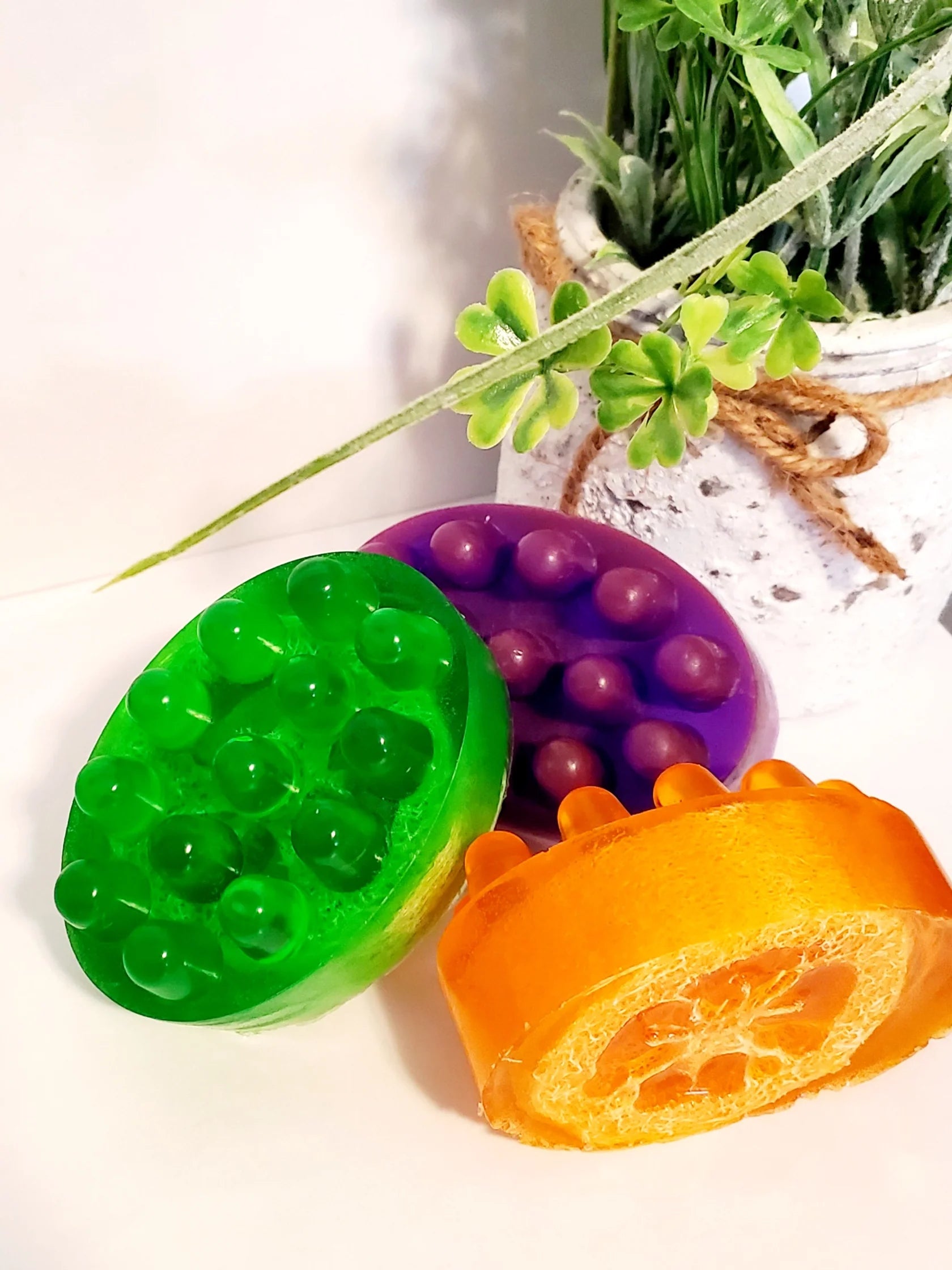 Massage soap with loofah for exfoliation with essential oils