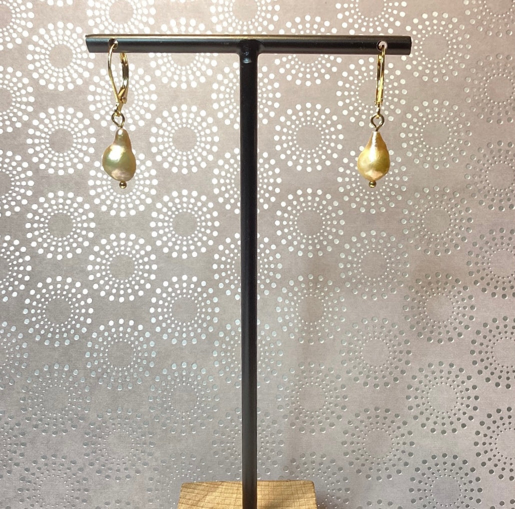 Earrings with pink peach baroque pearls