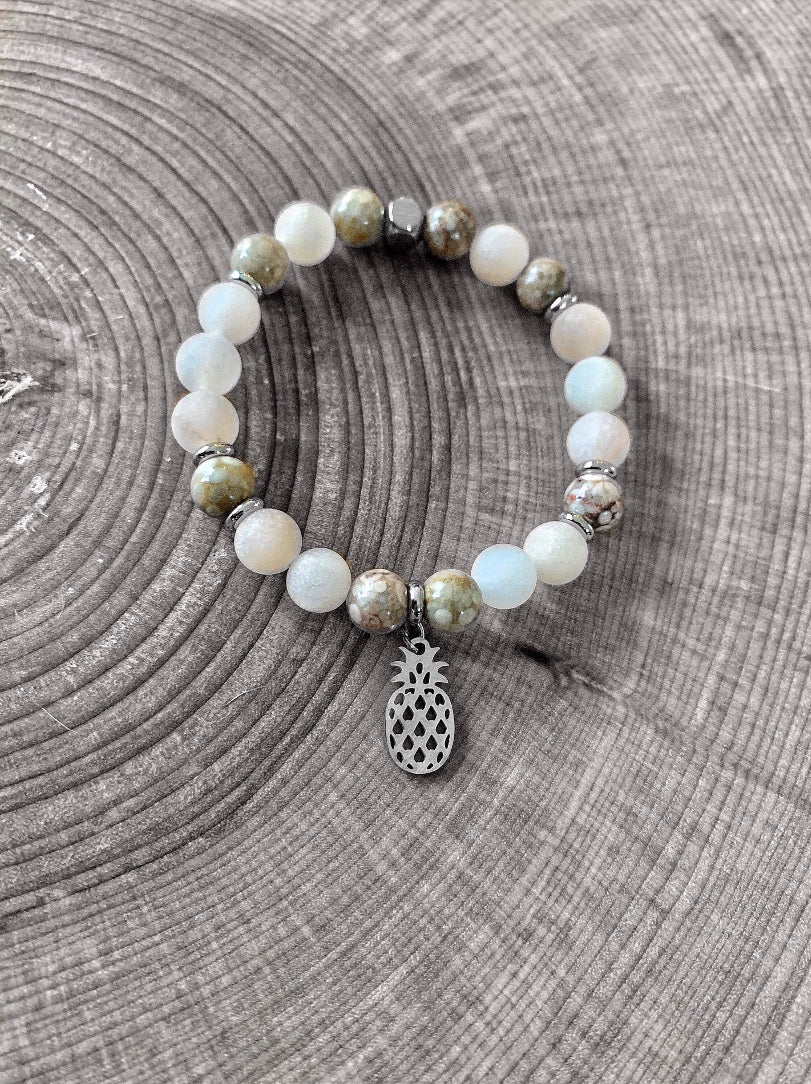 Bracelet made of various stones with stainless steel trim