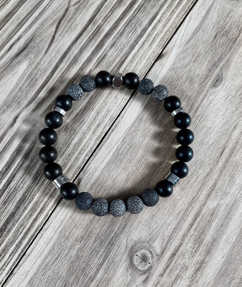 Bracelet of various stones with stainless steel trim