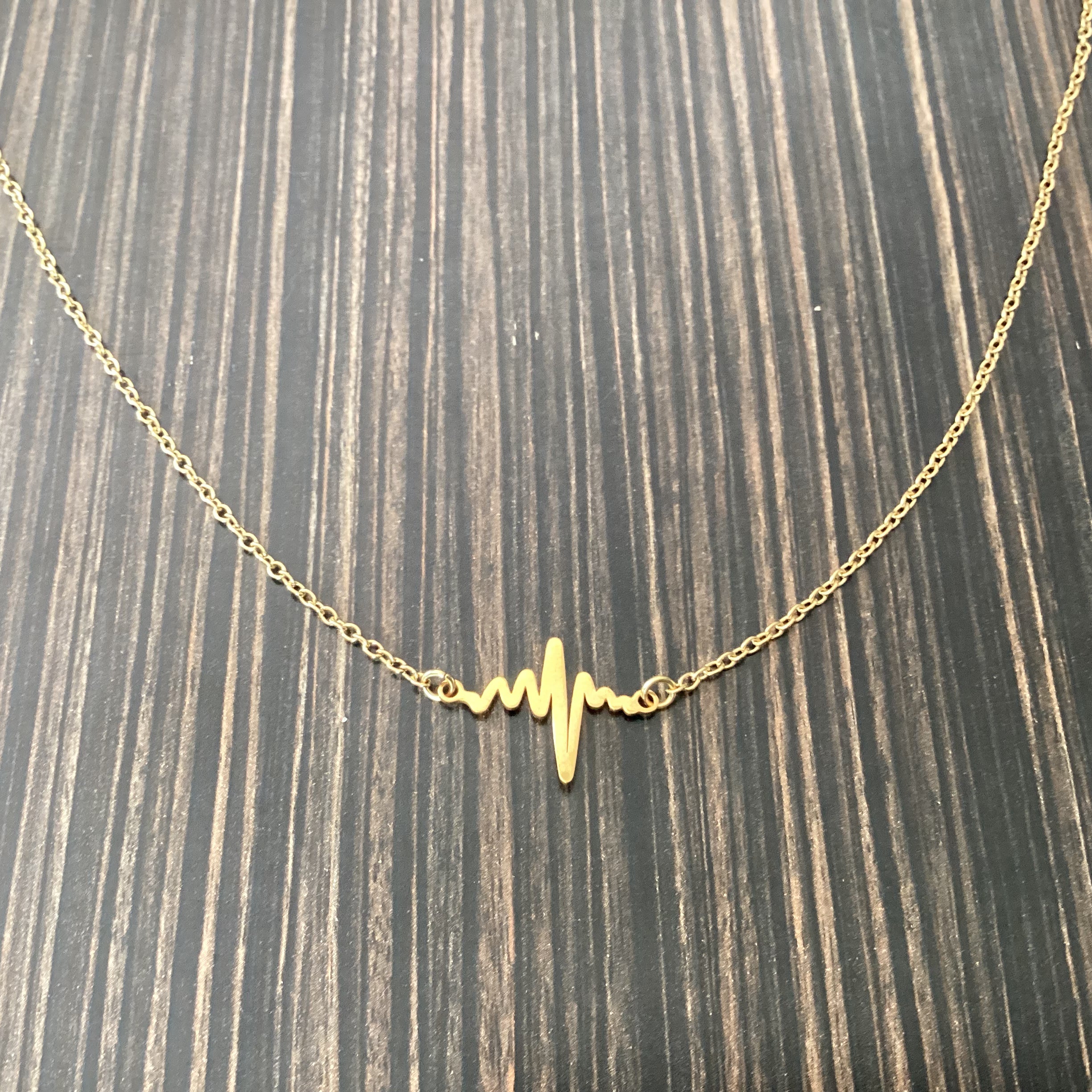Gold stainless steel heartbeat necklace