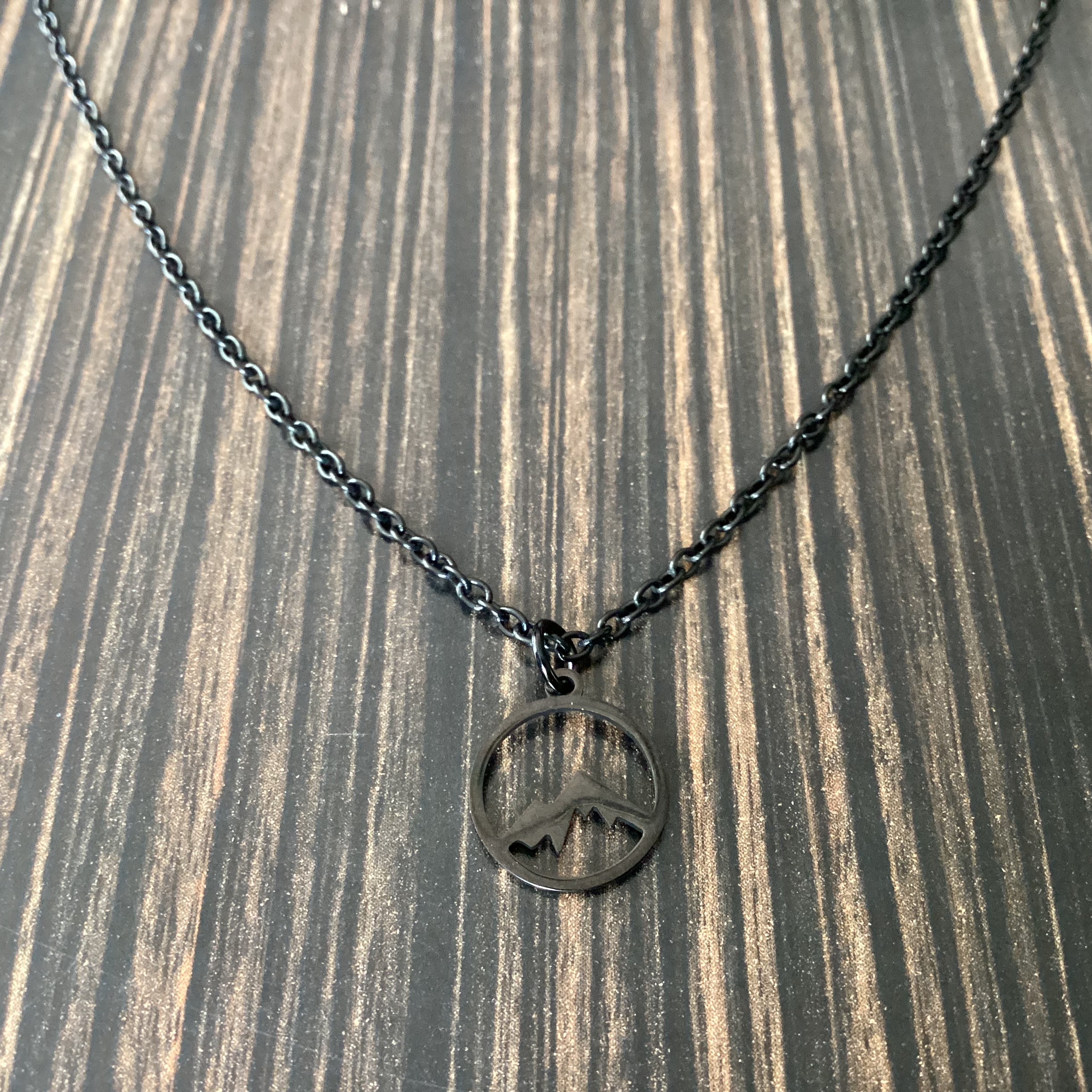Black stainless steel mountain necklace