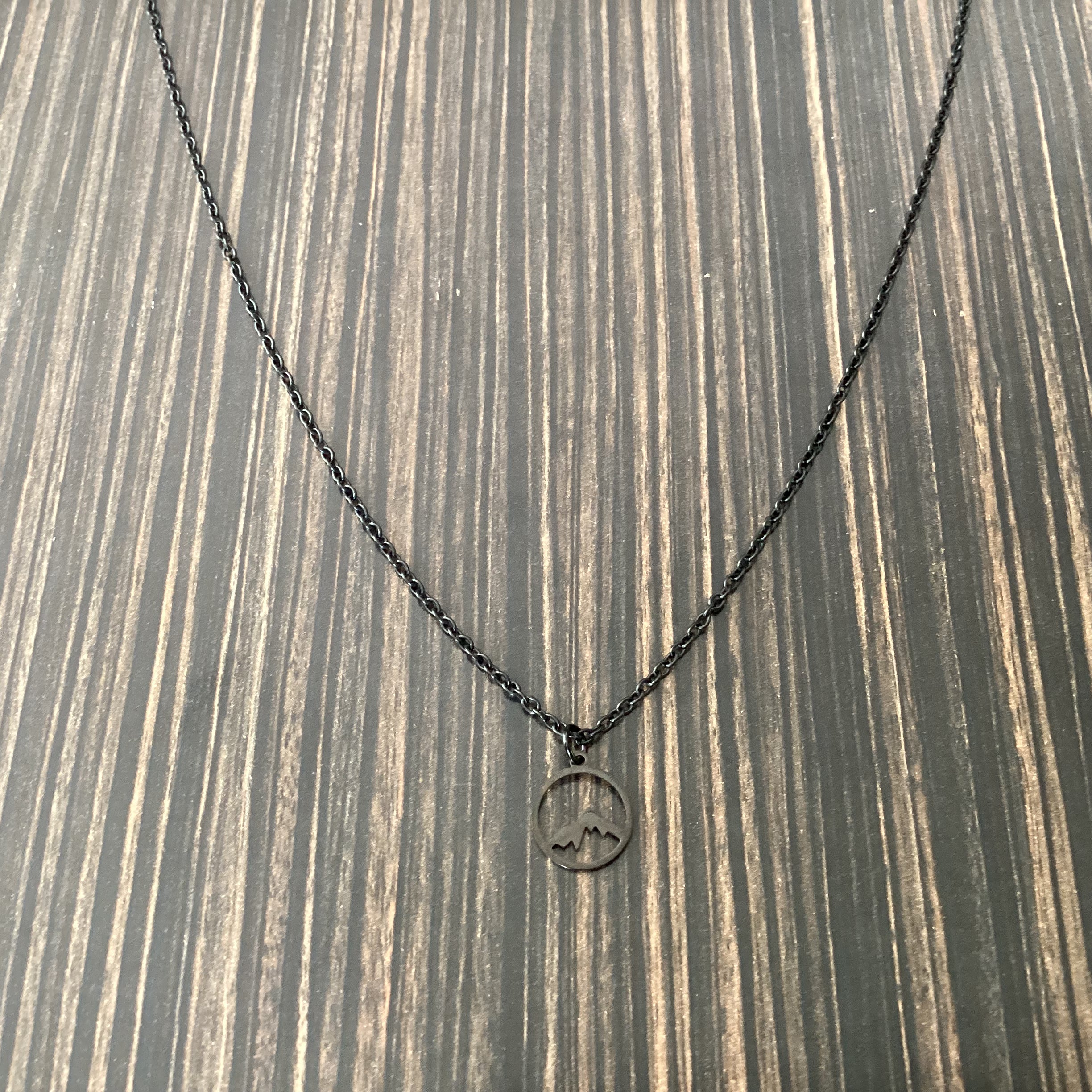 Black stainless steel mountain necklace