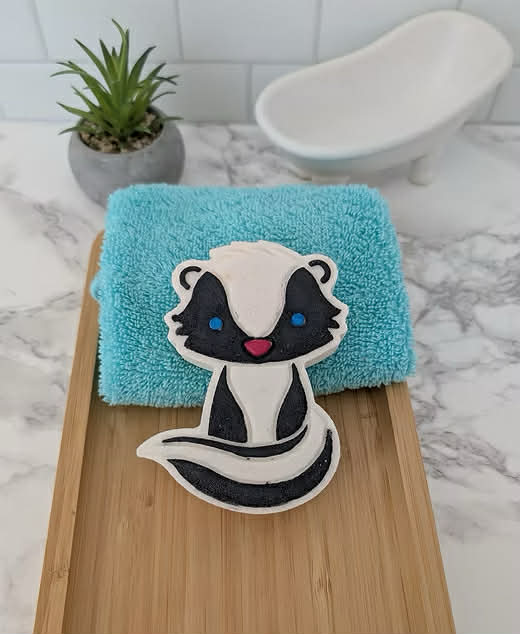 Bombe de bain moufette coquette