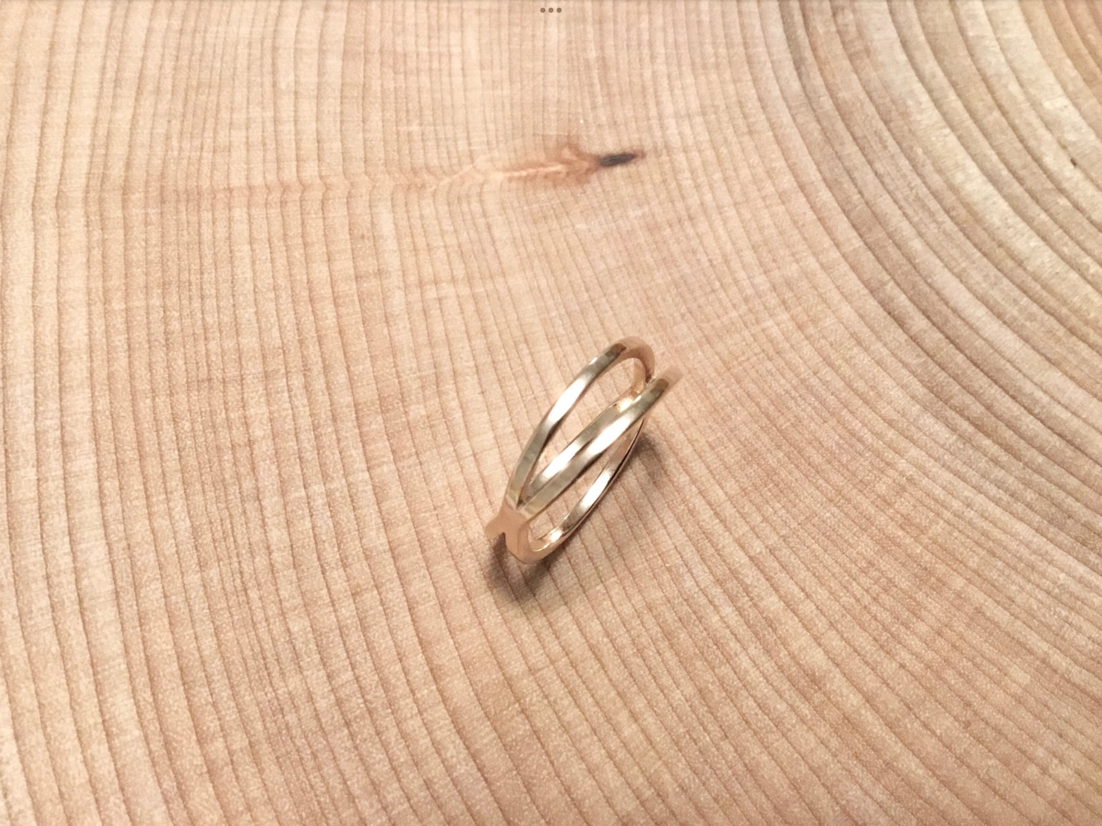 Bague minimaliste double croisée en inox or rose