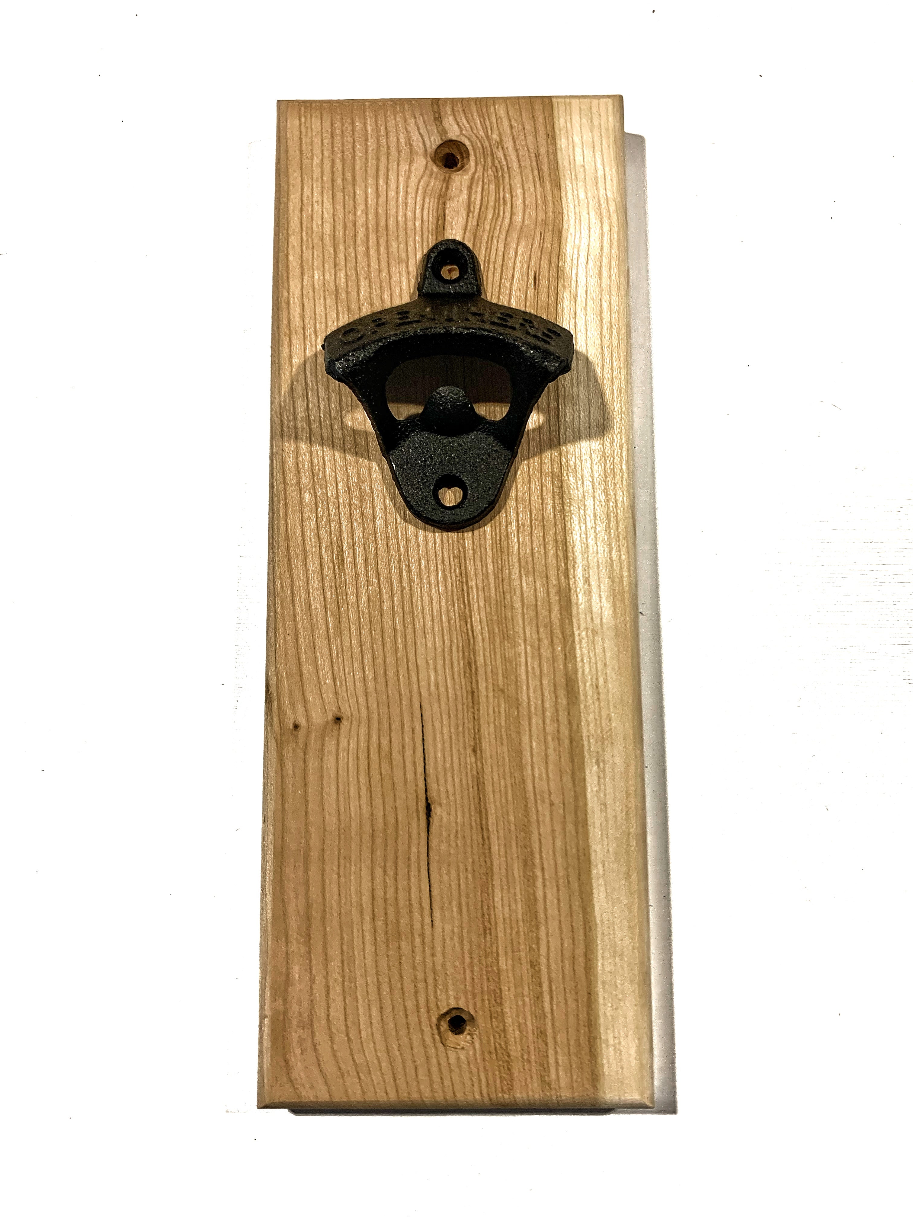 Wall mounted bottle opener