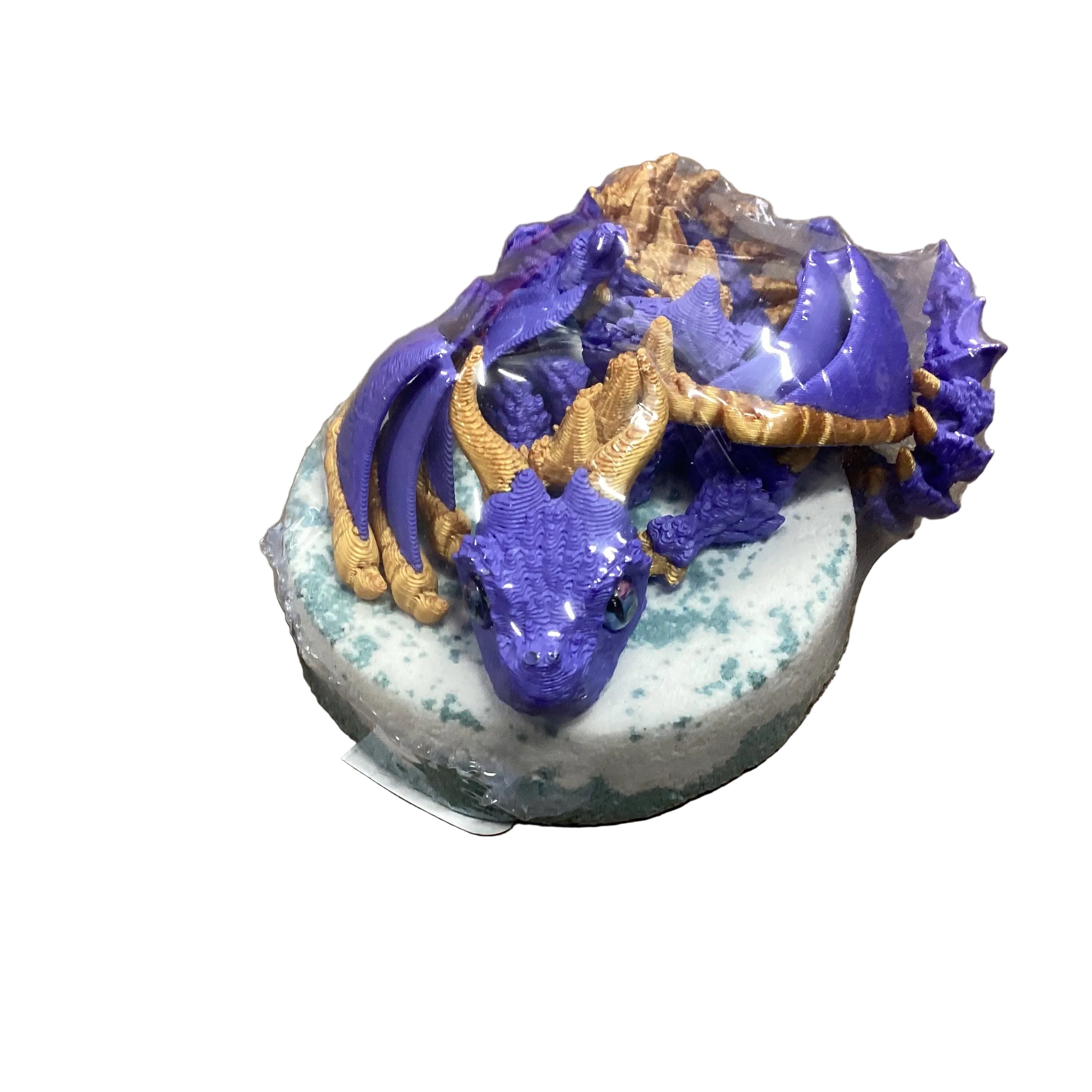 Bombe de bain avec jouet dragon articulé