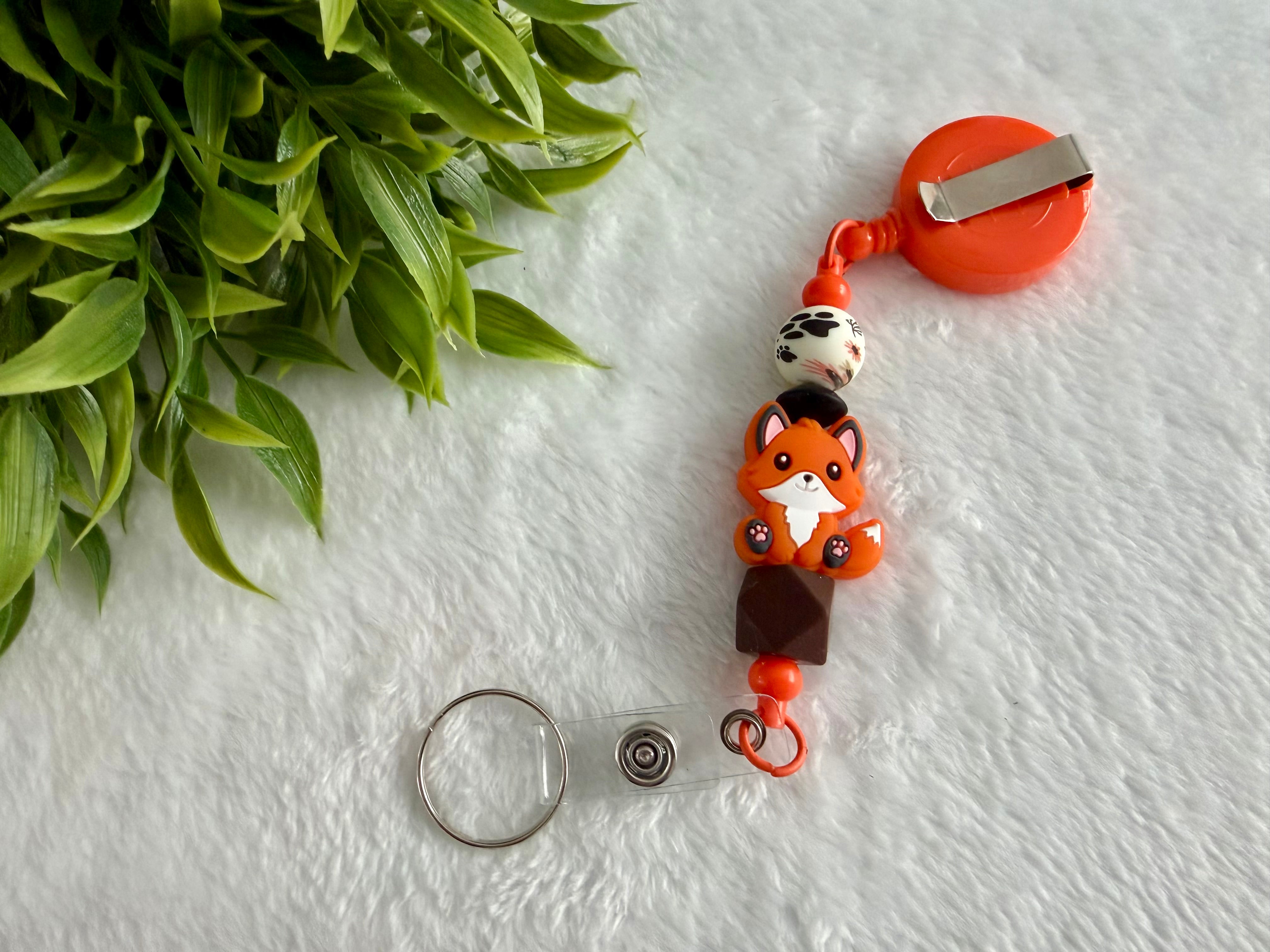 Attache rétractable renard