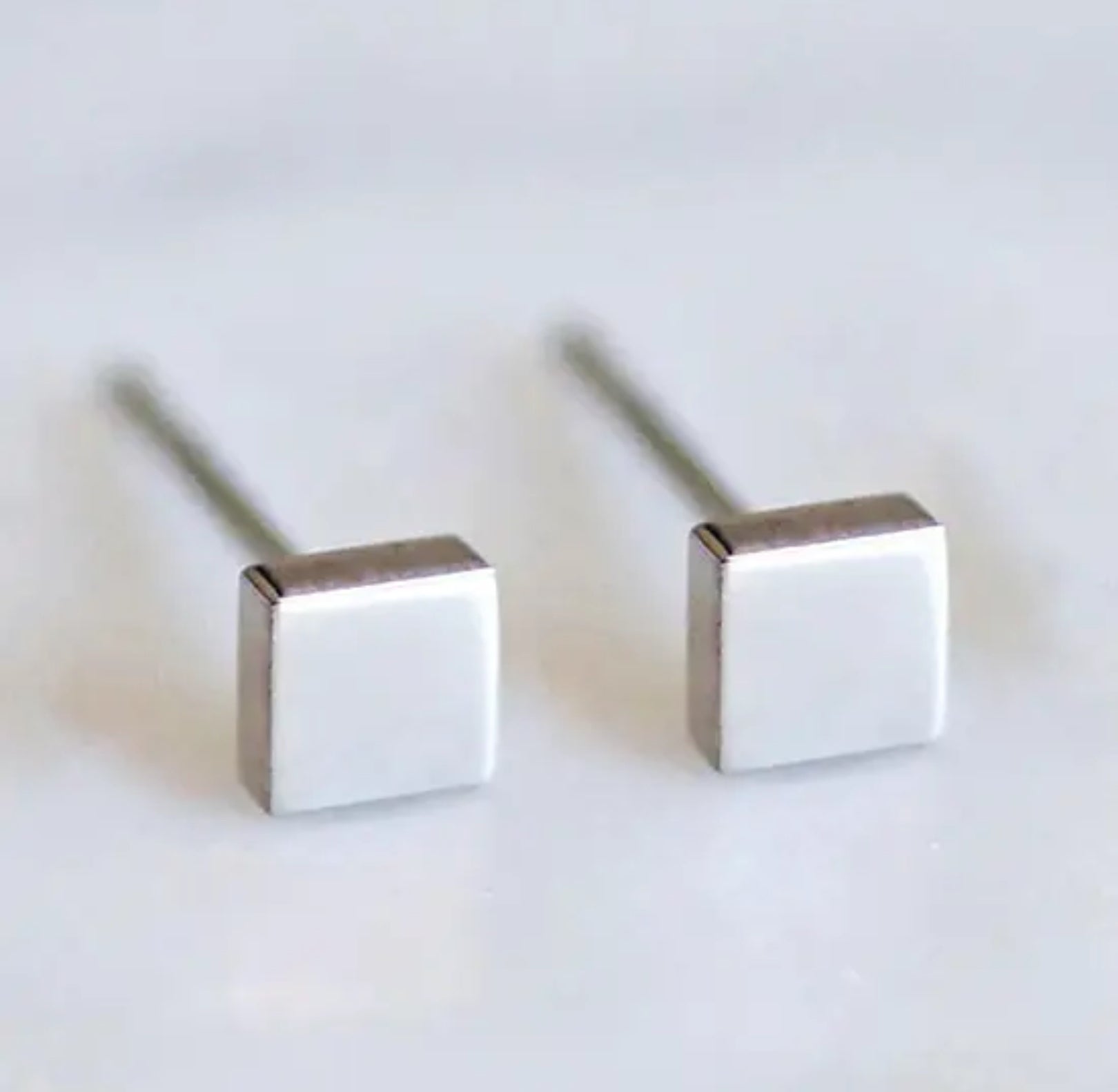 Boucles d’oreilles minimalistes en inox