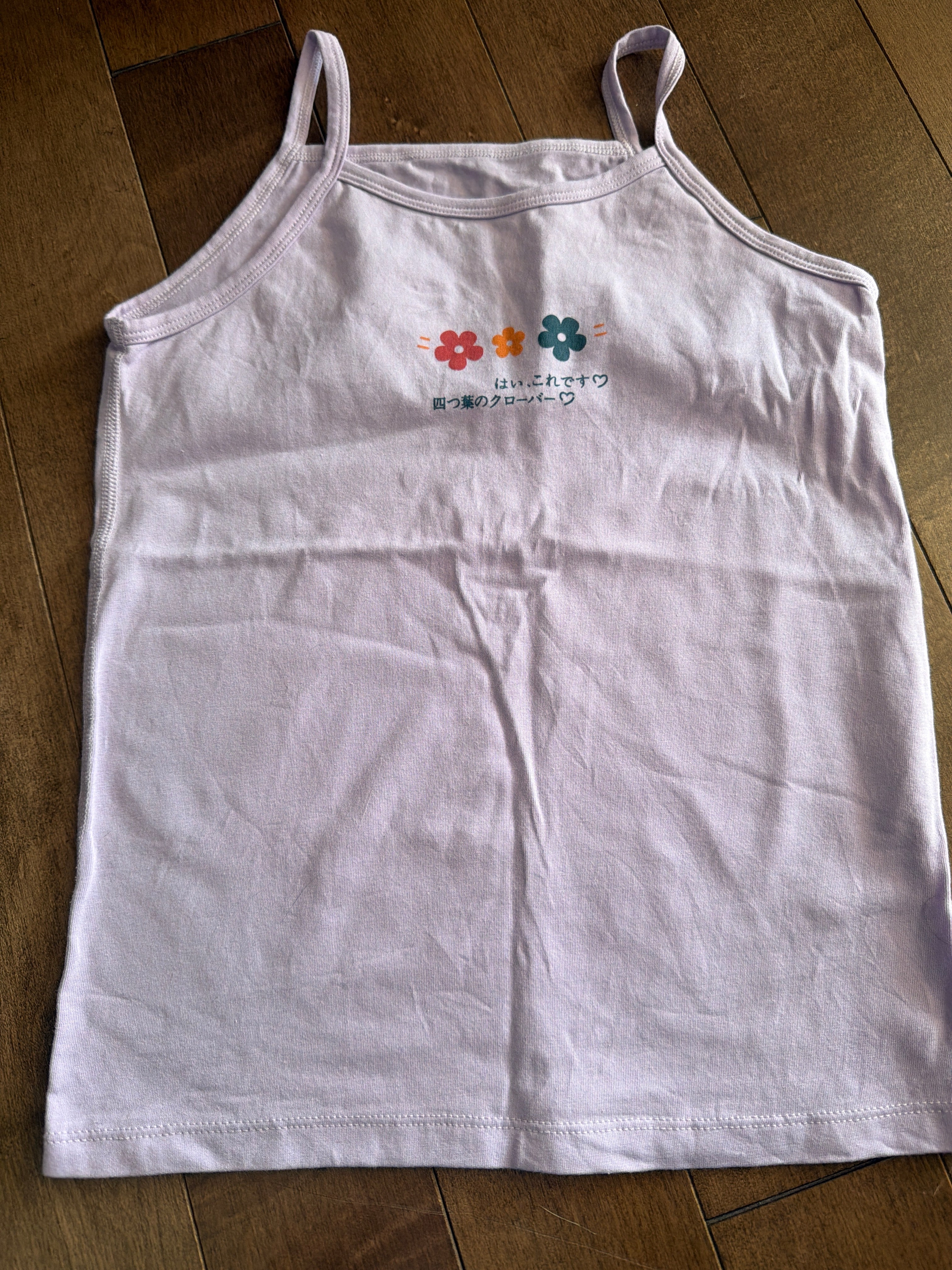 Camisole 6 ans comme neuve