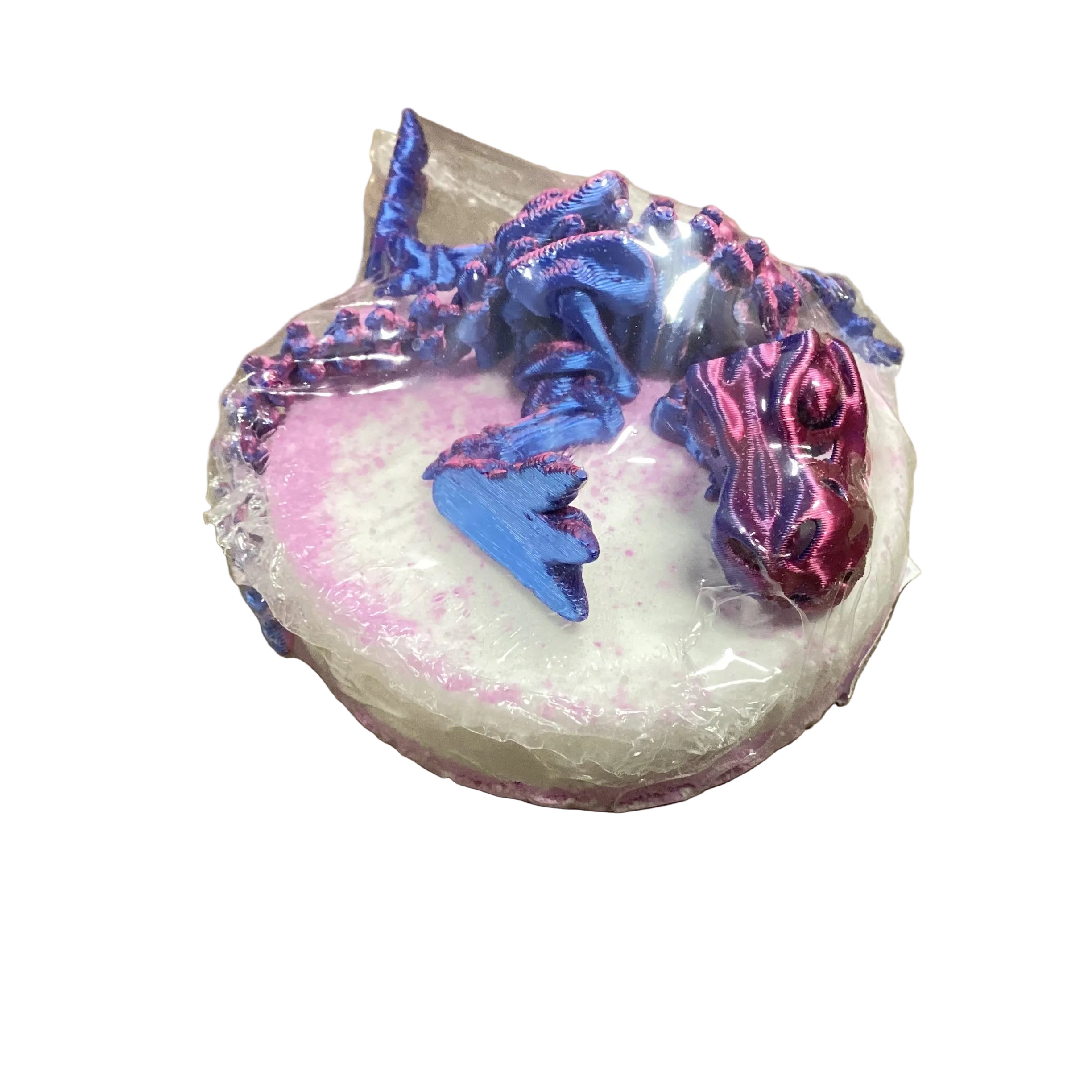 Bombe de bain avec jouet dino articulé