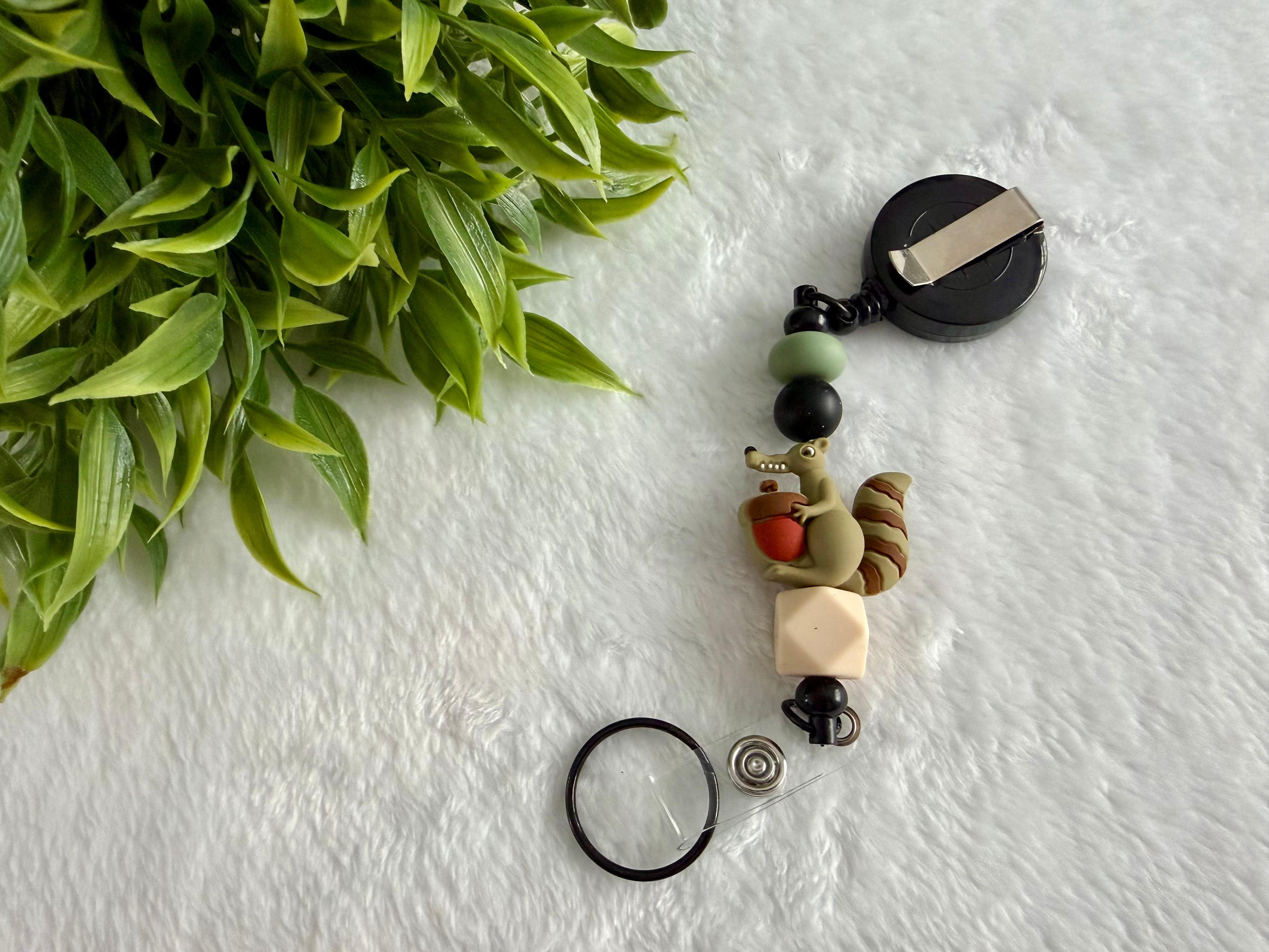 Attache rétractable écureuil