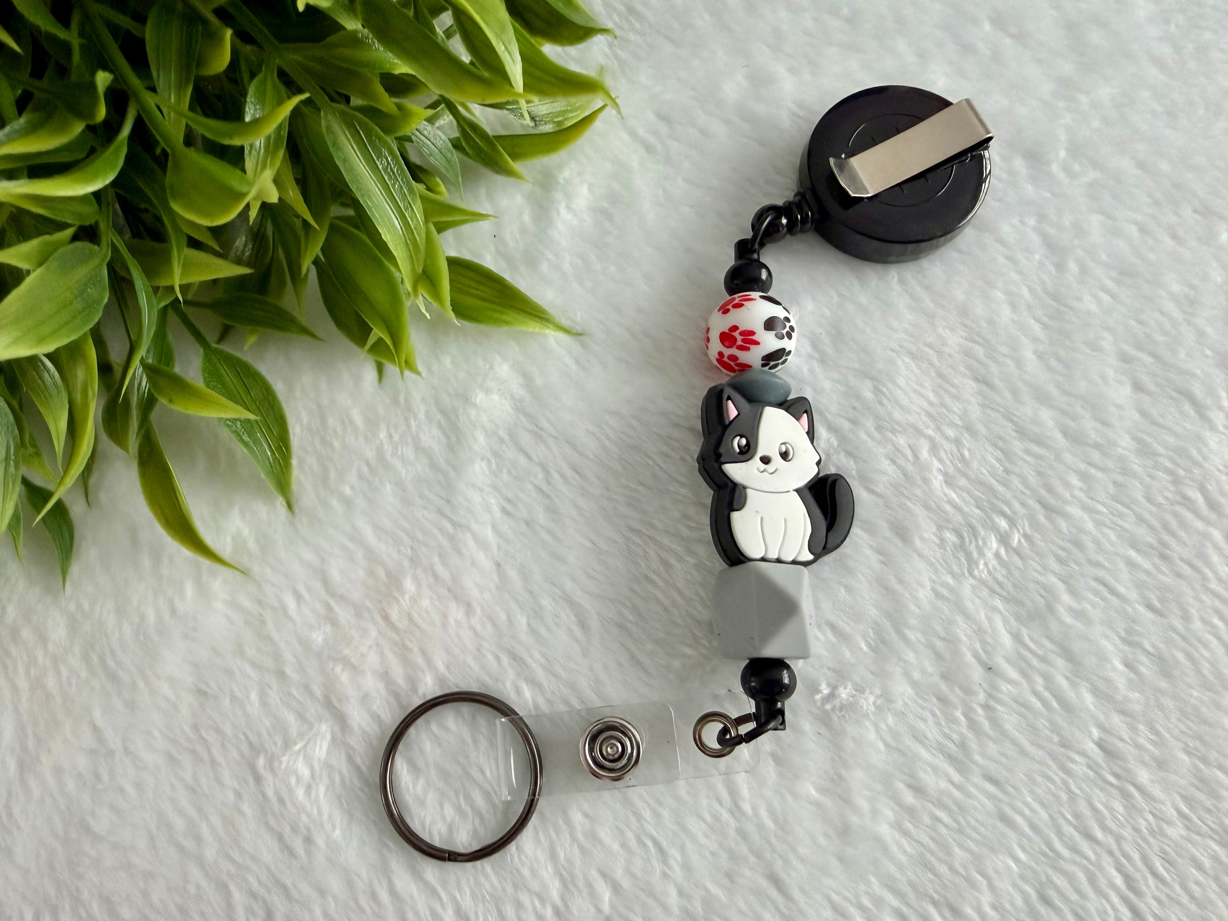 Attache rétractable chat