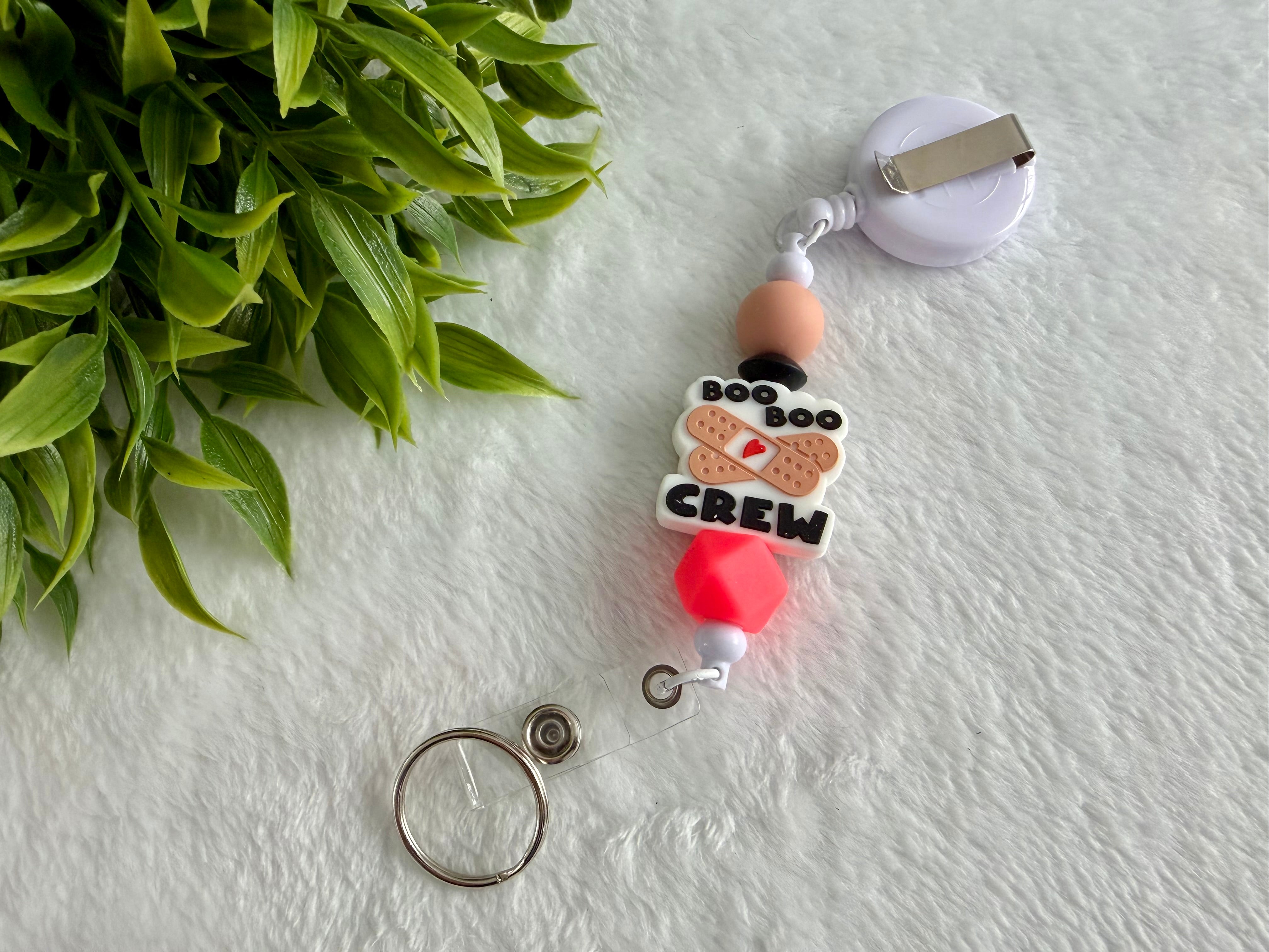 Attache rétractable boo boo