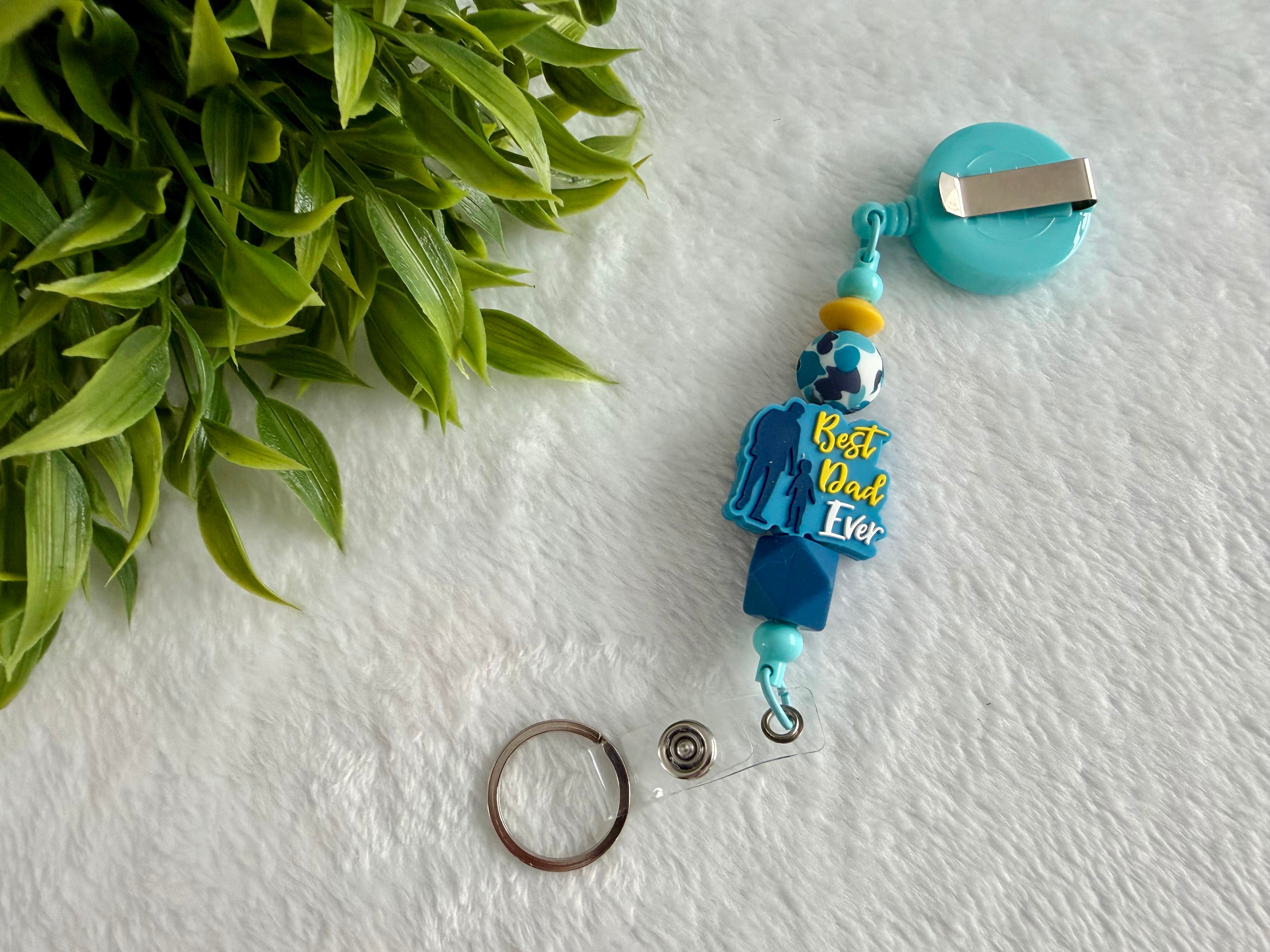 Attache rétractable papa