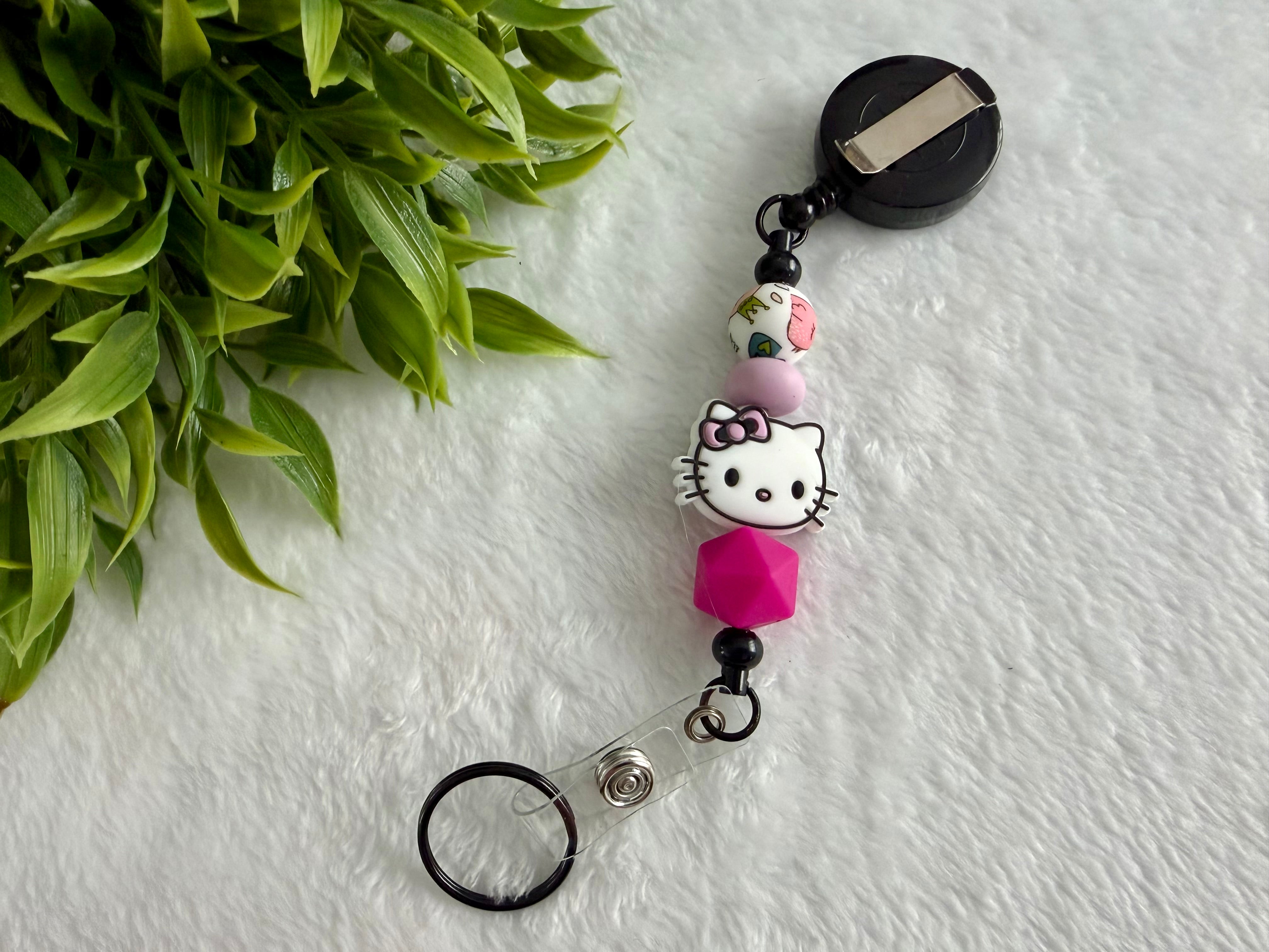 Attache rétractable chat