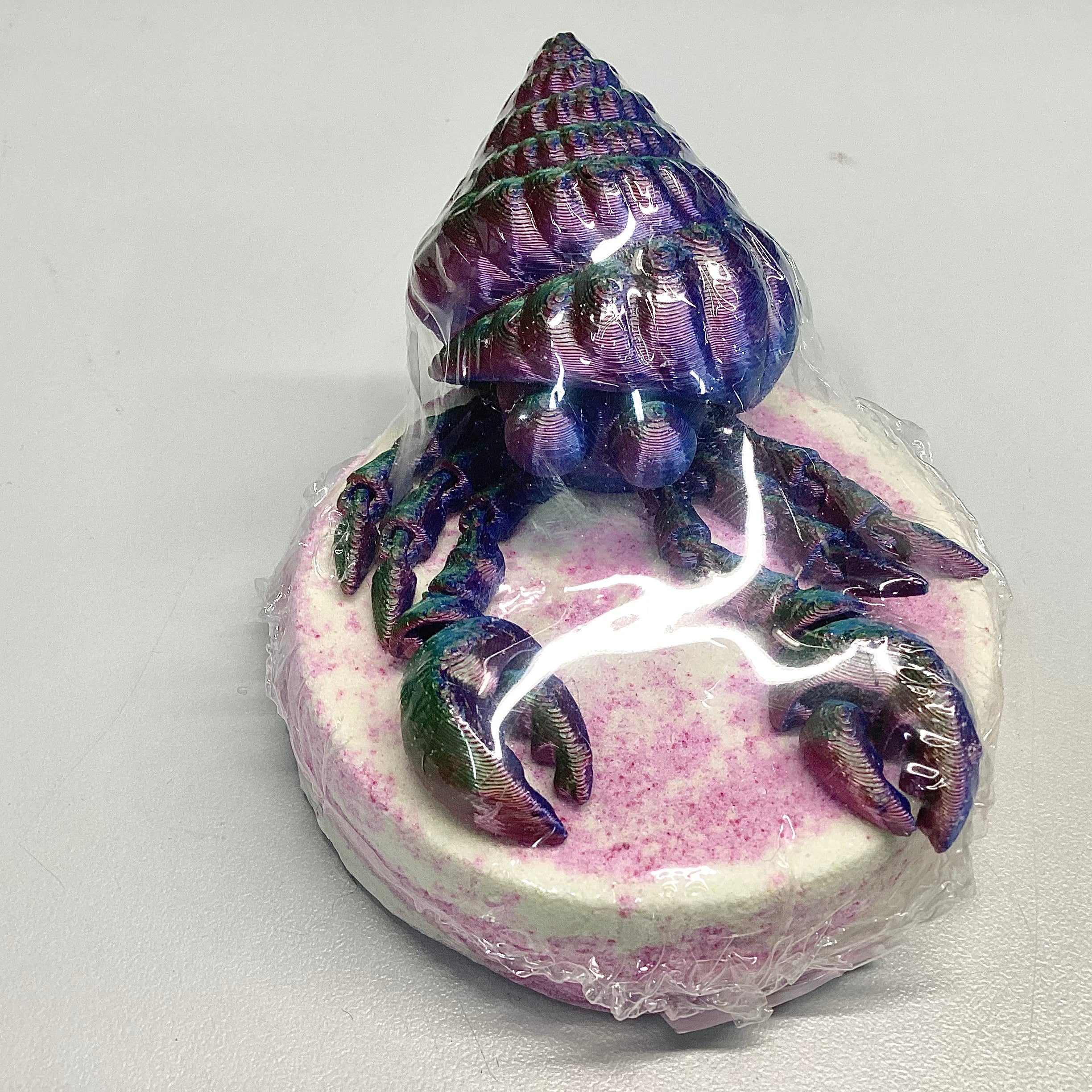 Bombe de bain avec jouet articulé Bernard l’hermite