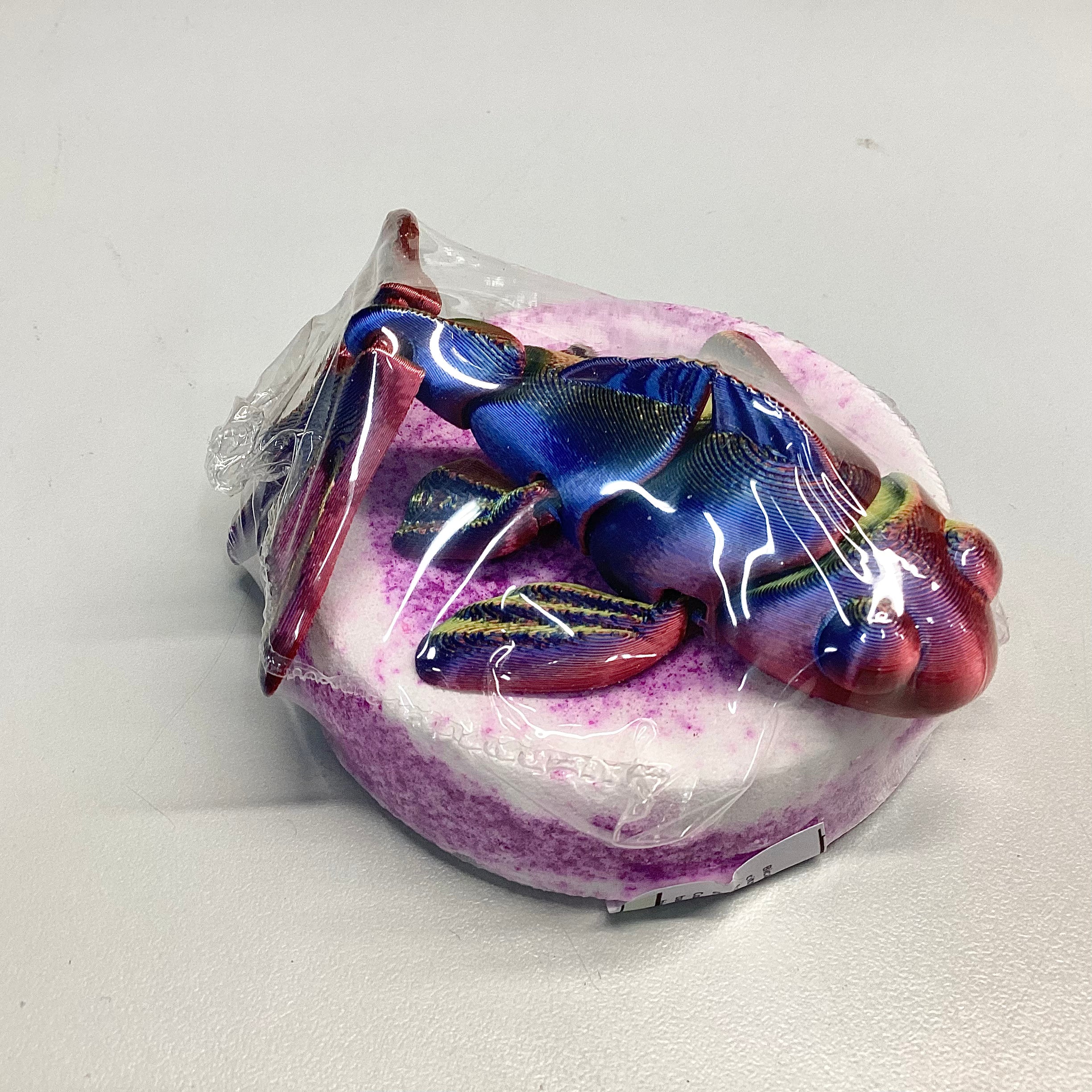 Bombe de bain avec jouet poisson articulé