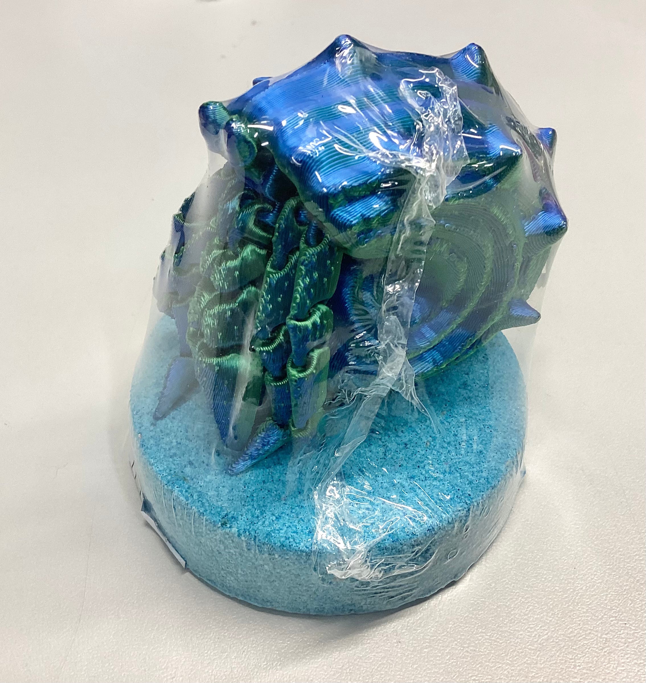 Bombe de bain avec jouet articulé Bernard l’hermite