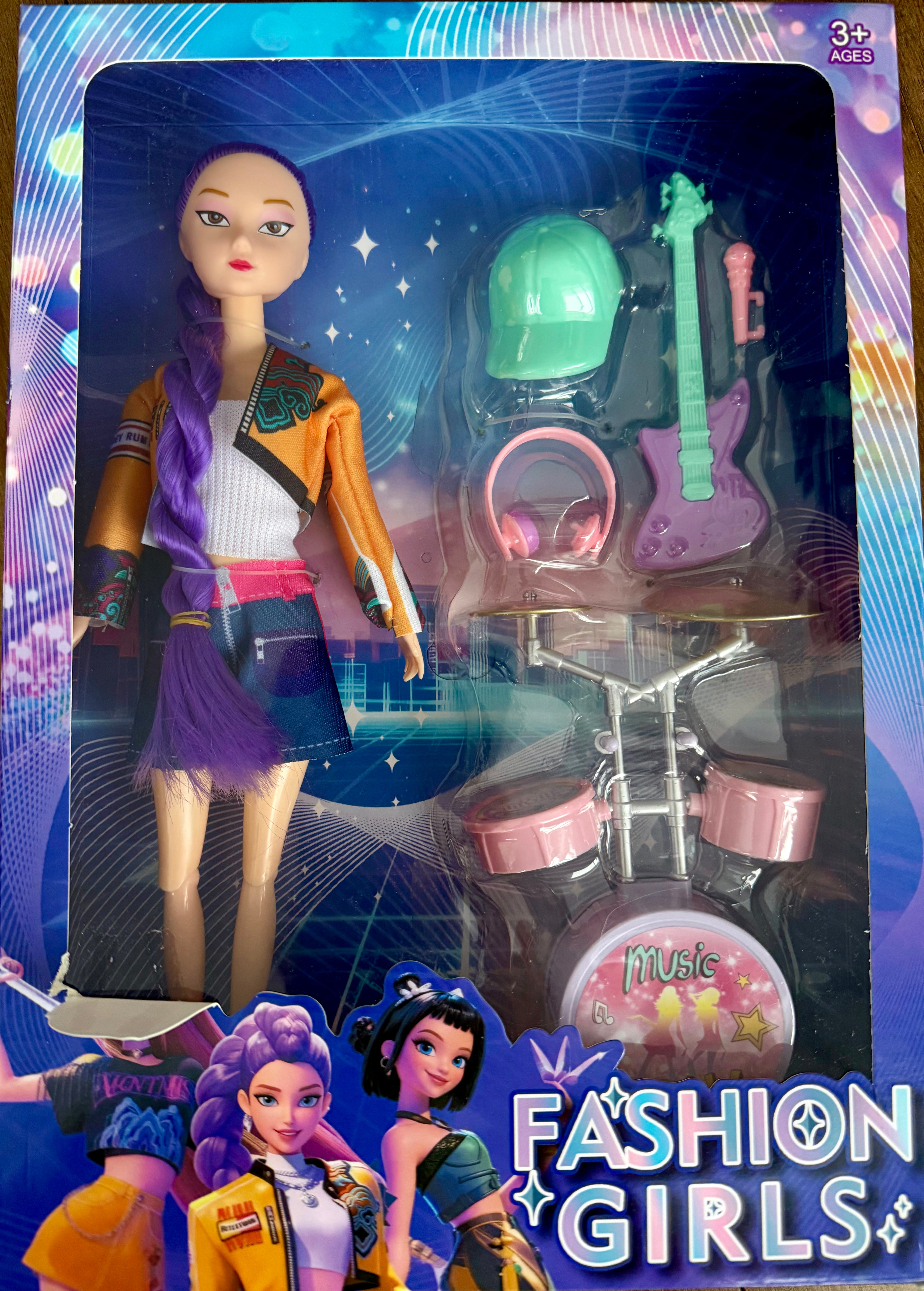 Poupée avec accessoires de musique