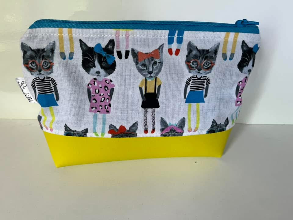 Pochette en tissus et vinyle