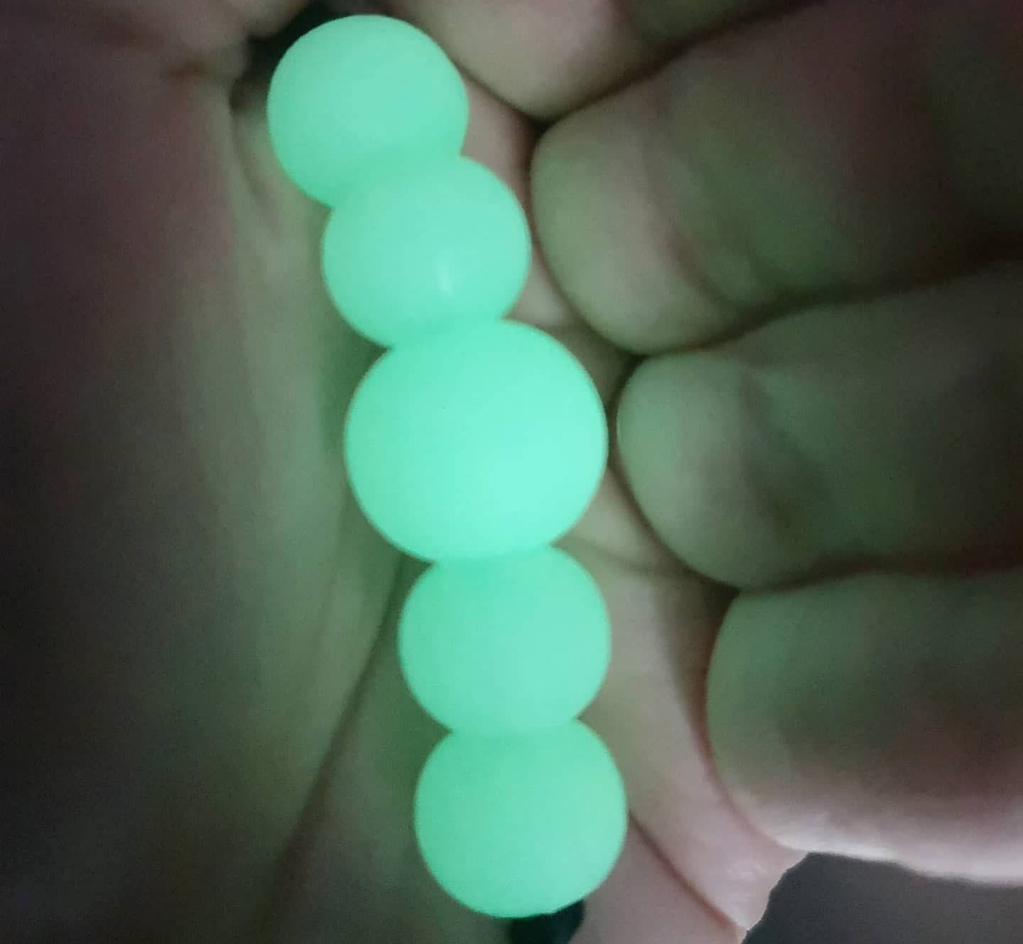 Bracelet de dentition en silicone brille dans le noir